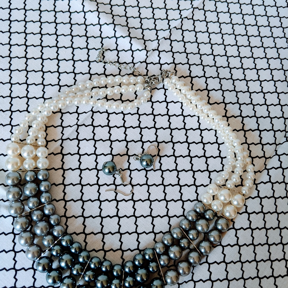 Faux pearls and earrings.